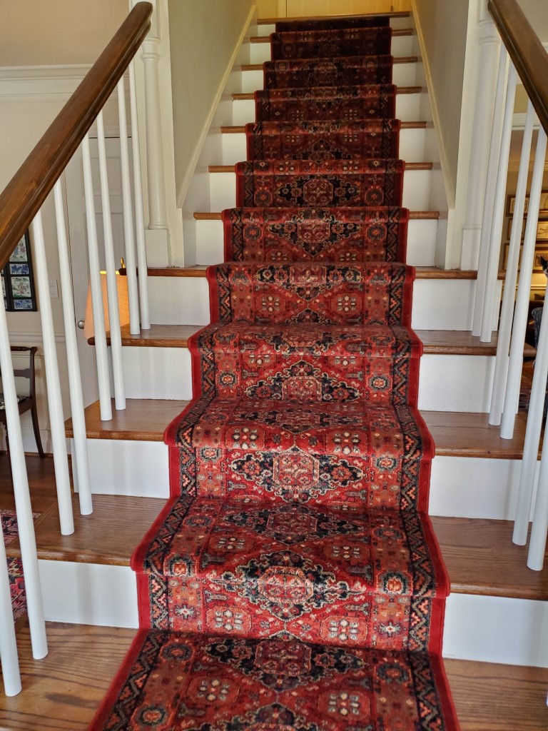 Runner Rugs - Stair Runner installation is done be professionals installer  at Oriental Designer Rugs, Atlanta, Georgia.