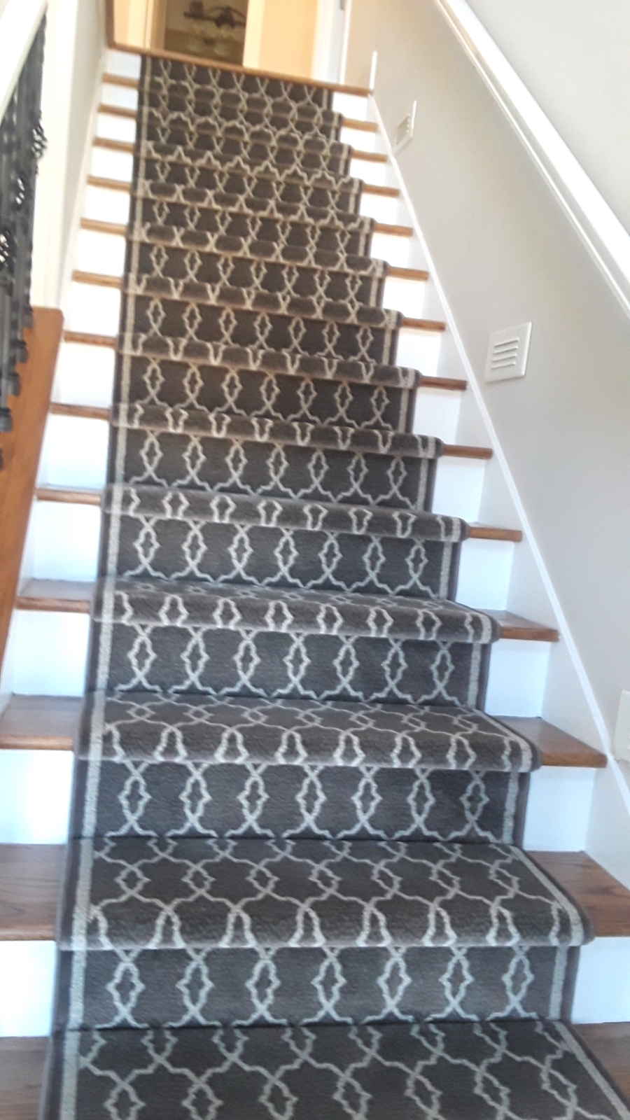 Runner Rugs - Stair Runner installation is done be professionals installer  at Oriental Designer Rugs, Atlanta, Georgia.